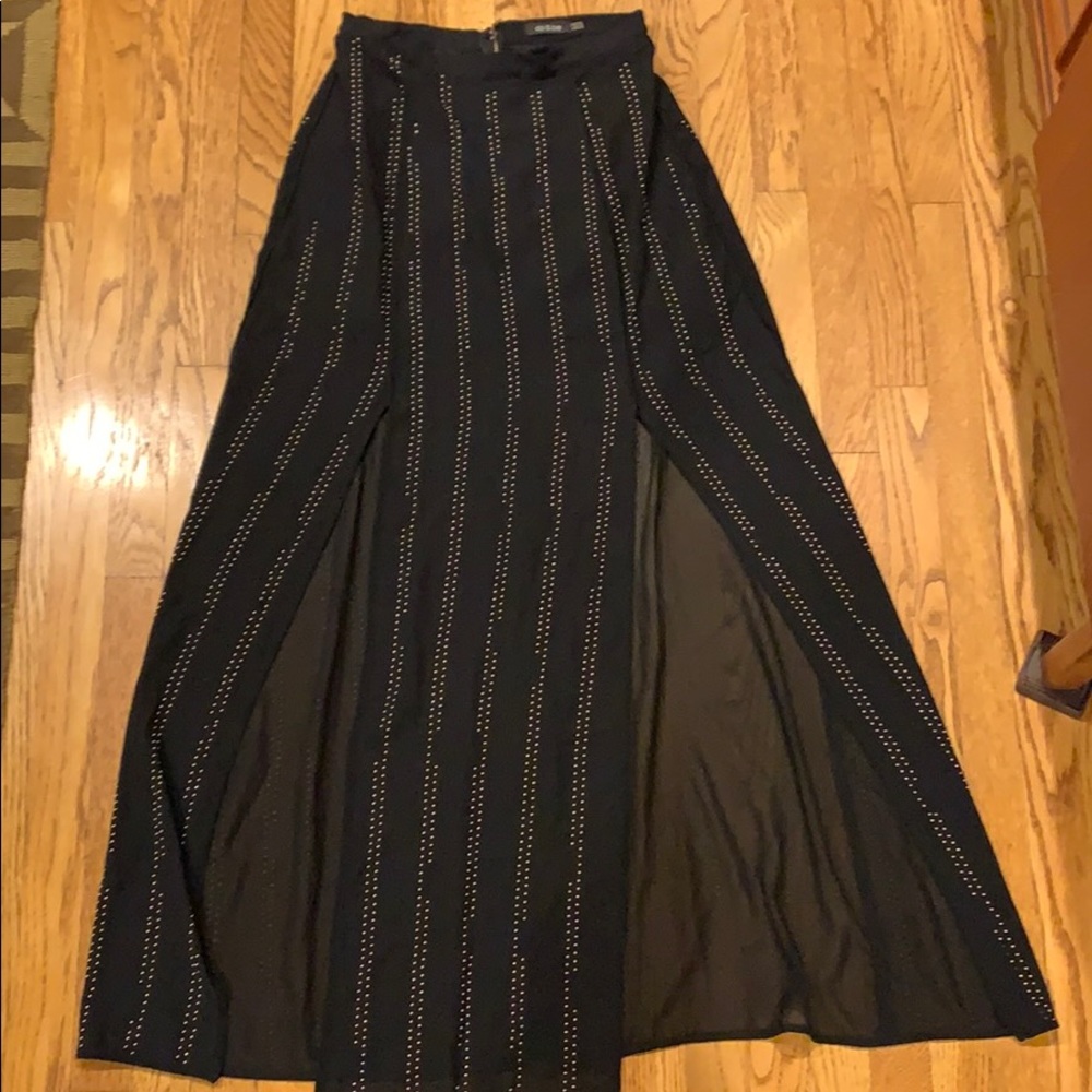 Split leg skirt with gold metal detail